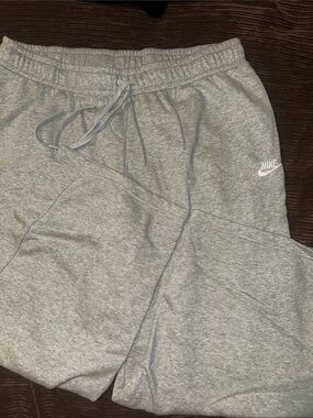 Nike woman’s Light Gray Fleece Joggers with Drawstring